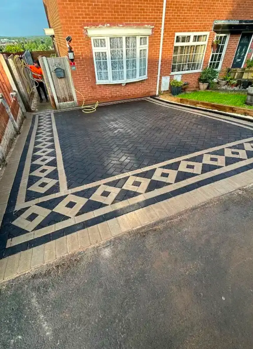 Block paved driveway with diamond border