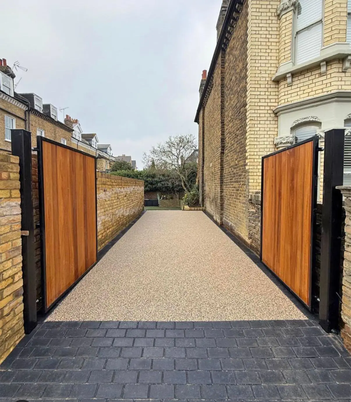 Resin bound driveway with timber gates