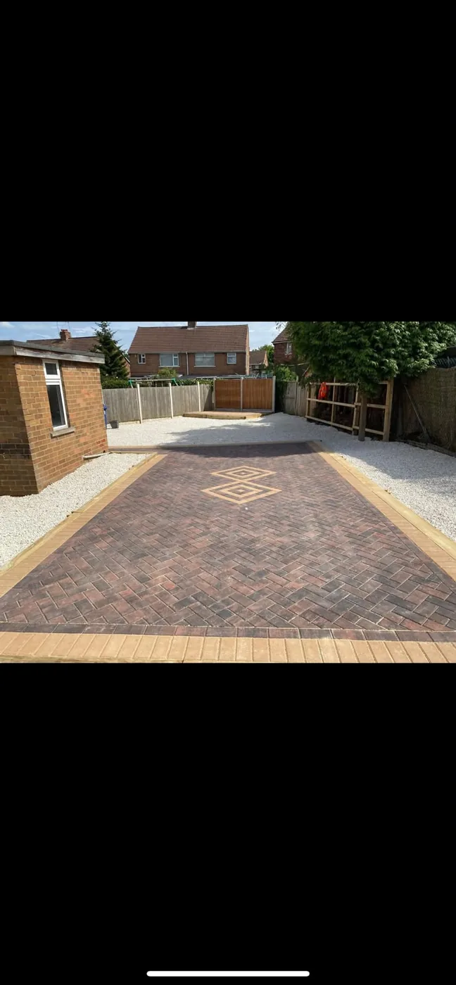 Block paved driveway with gravel