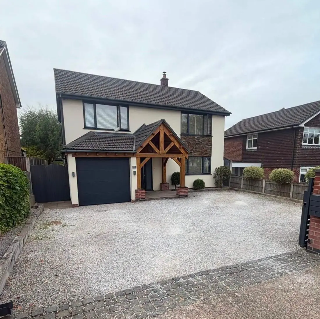 Silver resin bound driveway at a detached house